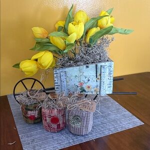 Wooden wheelbarrow with Tulips